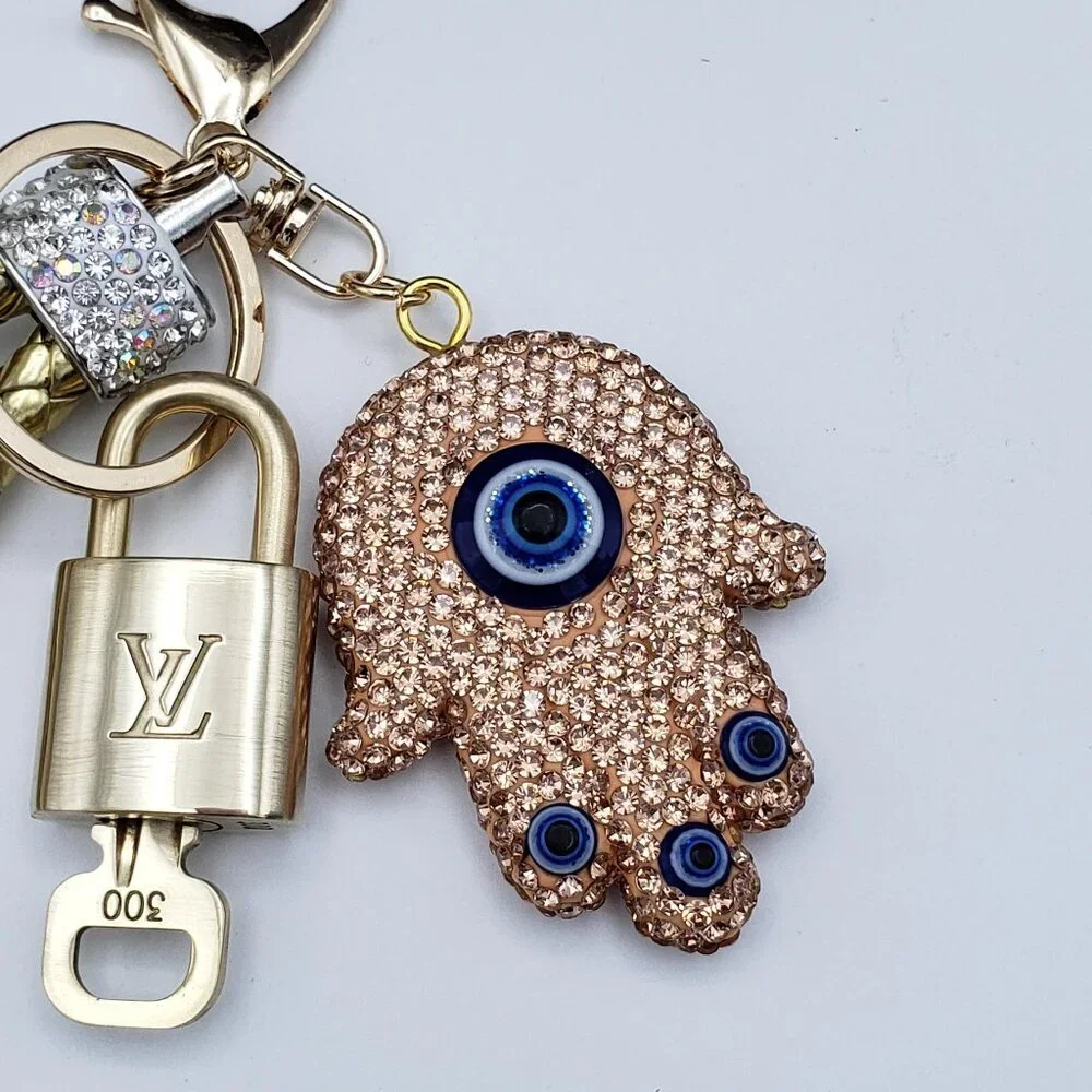 Authentic Louis Vuitton Lock & Key with unbranded Evil Eye Bagcharm 011526